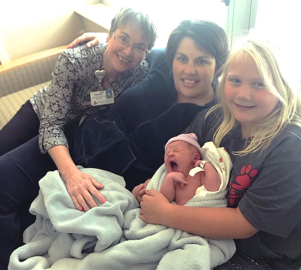 Sawyer Brook Knight is welcomed into the world by her grandmother, Teresa Collins, and her mom and sister, Krystal and Skyler Knight. 